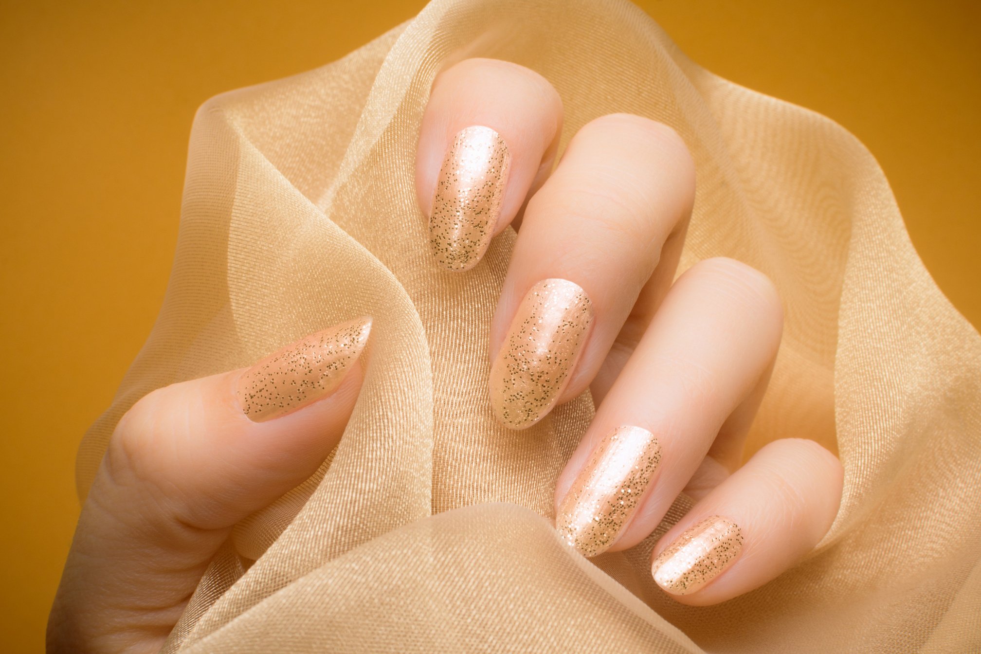 glittered beige nails